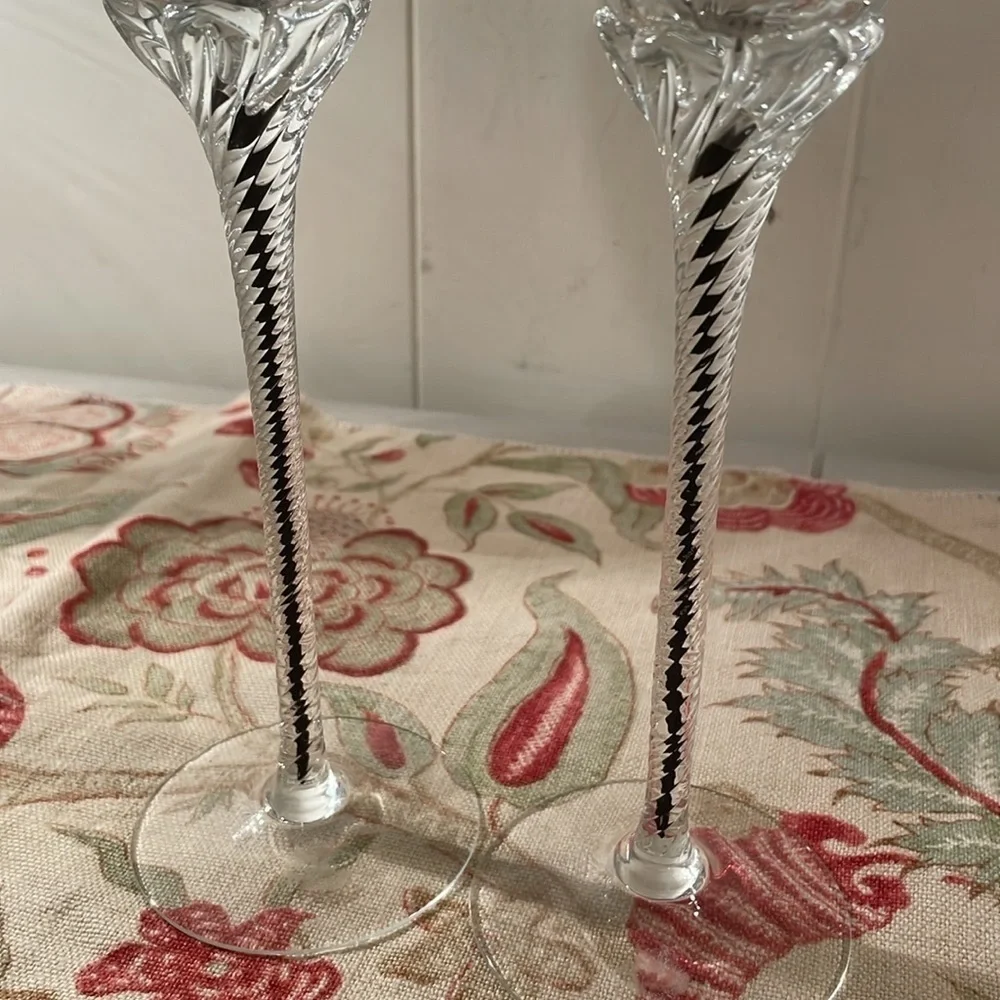 Elegant Handblown Twisted Stem Black Detail Cradling a Ribbed Candle Drip Plate